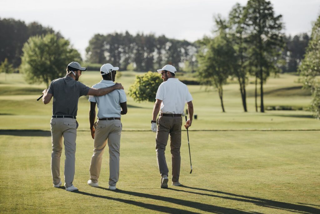 Three guys on golf course